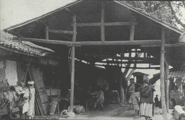 THE WELCOME FAMILIAR TEA-HOUSE

In many provinces of China, tea-houses, of which this one in Eastern
Szech'uan is typical, are to be found about every ten li (3 miles) on
the main road.
