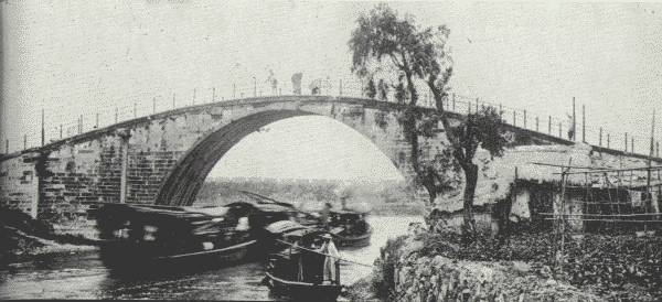TYPICAL SINGLE-SPAN BRIDGE OF INLAND CHINA.

Engineers say that China possesses bridges of more varied design than
any other country.