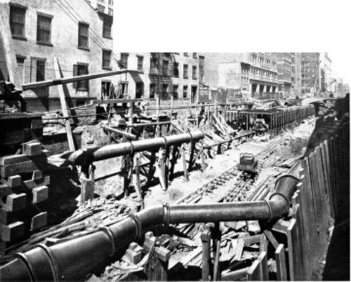 LARGE GAS AND WATER PIPES, RELAID BEHIND EACH SIDE WALL
ON ELM STREET