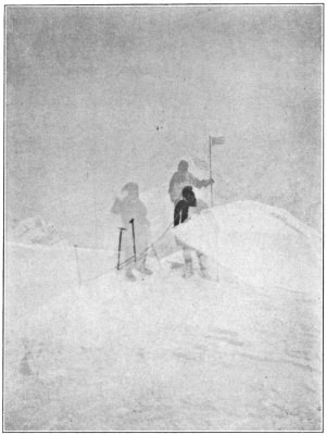 Robert Tatum raising the Stars
and Stripes on the highest point in North America.