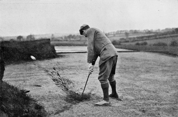 PLATE LIV. "WELL OUT!" FINISH OF AN ORDINARY STROKE IN
A BUNKER WHEN MUCH SAND IS TAKEN. THE BALL MAY BE SEEN RISING ABOVE THE
BUNKER