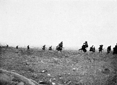 OVER THE TOP AT MARTINPUICH, SEPT. 15, 1916. I PHOTOGRAPHED
THIS SCENE AT 5.20 IN THE MORNING