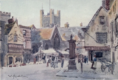 PEASHILL

The Chancel of St. Edward’s Church is seen behind the stalls in the
roadway, and the Tower of Great St. Mary’s in the distance. On the right
is the Old Bell Inn and the old town pump is in the foreground.
