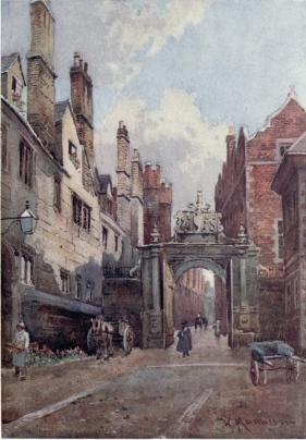 NEVILE’S GATE, TRINITY COLLEGE

To the left are the College kitchens and on the right is Bishop’s
Hostel. The buildings on the left are among the most ancient in this
college. Through the picturesque old gateway we see up the lane into
Trinity Street.