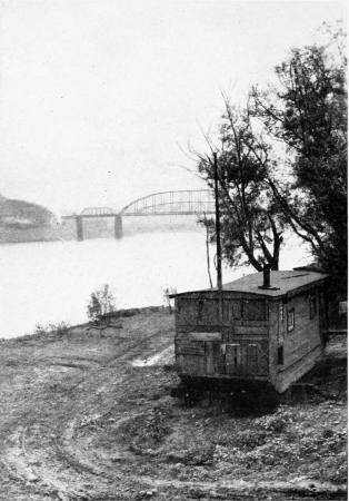 The waterside at Martin’s Ferry. Near this spot stood
the little brick house in which Mr. Howells was born.