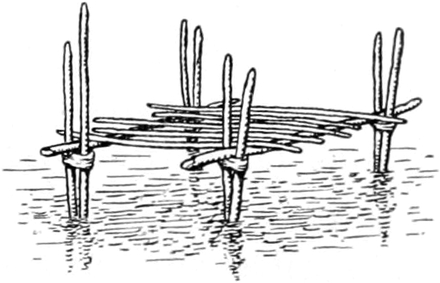 Holzgestell, auf dem ein
   Fischer sitzt