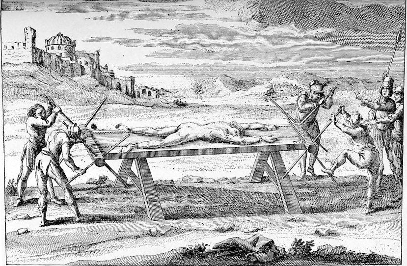 A historical black-and-white engraving depicting a person being stretched on a large wooden rack in an outdoor setting. Four operators use long levers to turn the rollers at both ends of the table, pulling the victim’s limbs taut while soldiers stand by watching. A stone fortress is visible on the hill behind them.