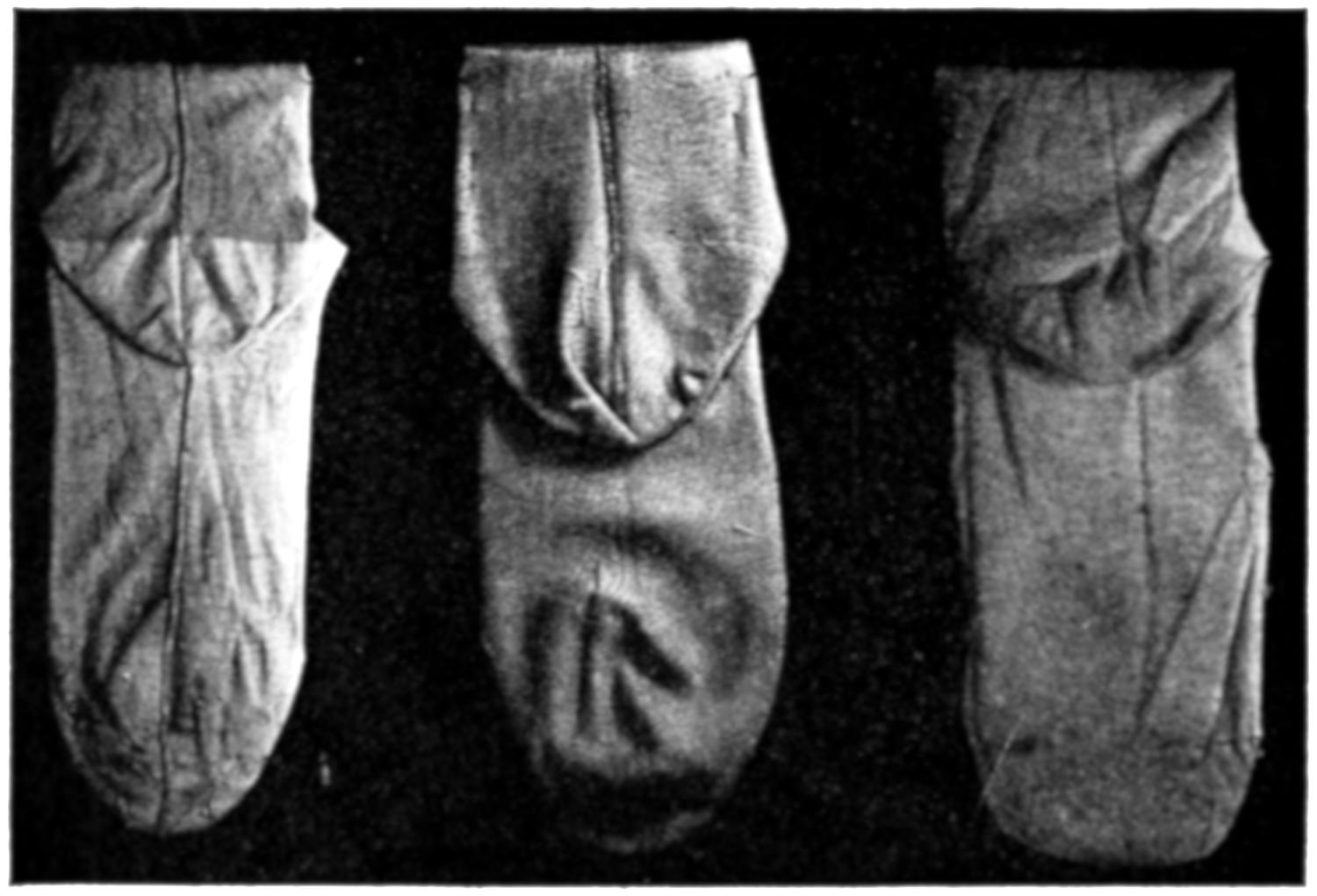 Three knitted stockings